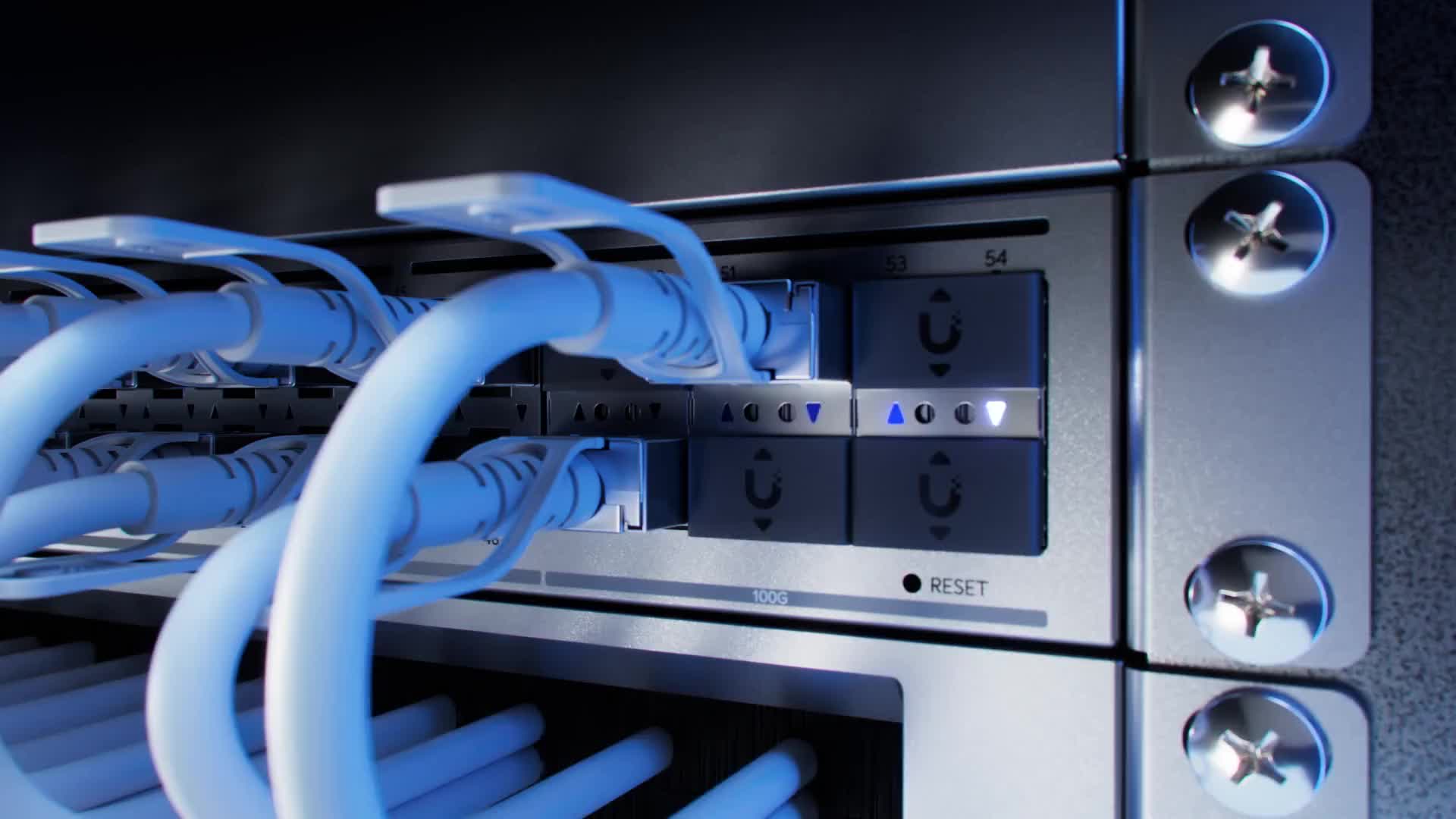 Official UniFi aggregation switch close-up showing connected high-speed optical transceivers and rack hardware